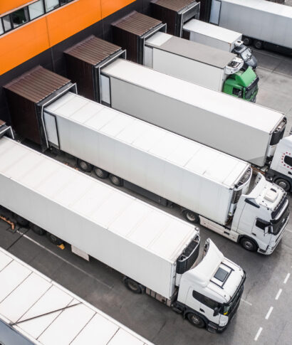 Top view of trucks in the distribution hub Top view of trucks in the distribution hub